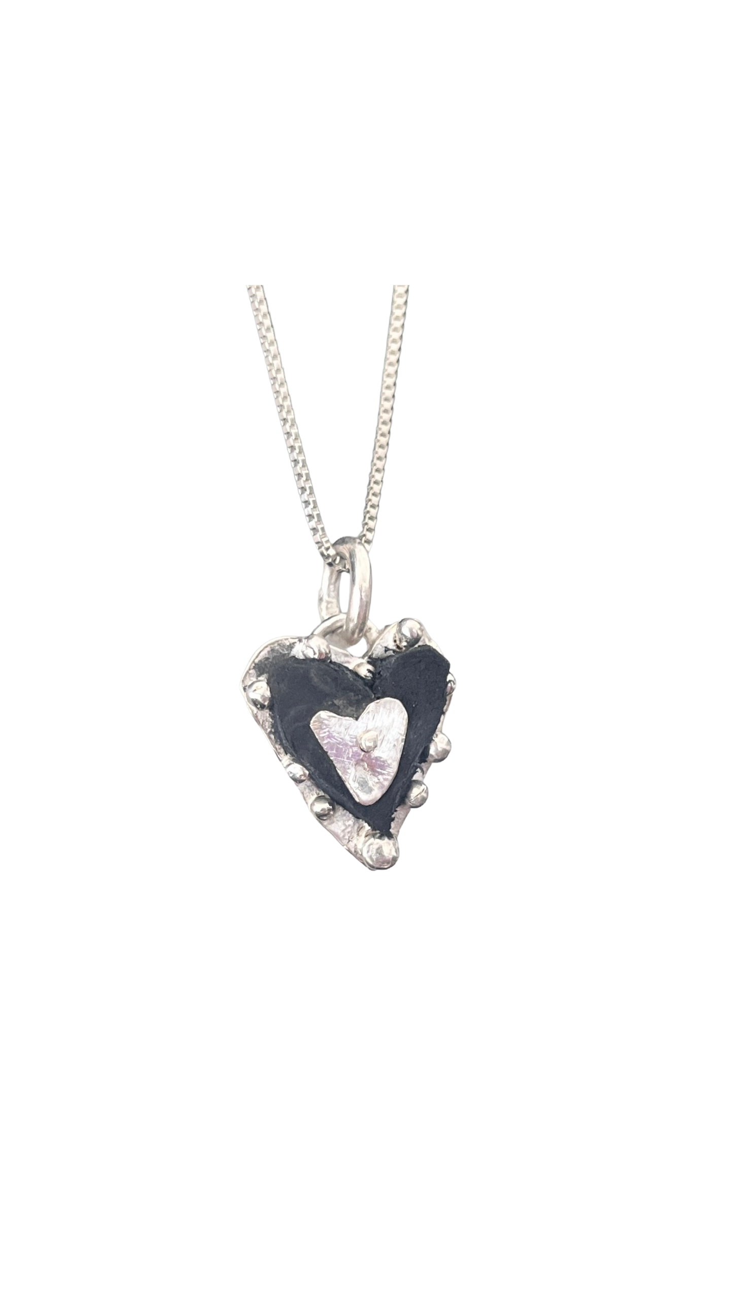 Leather hearts and silver necklace